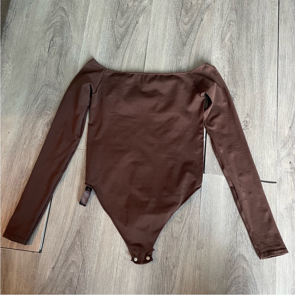 Skims off the shoulder bodysuit